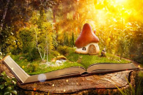livre ouvert avec des éléments issus de l'univers des contes qui en sortent